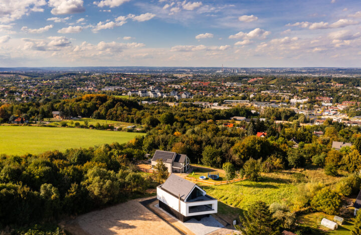 A modern house with large glazing on a hill!