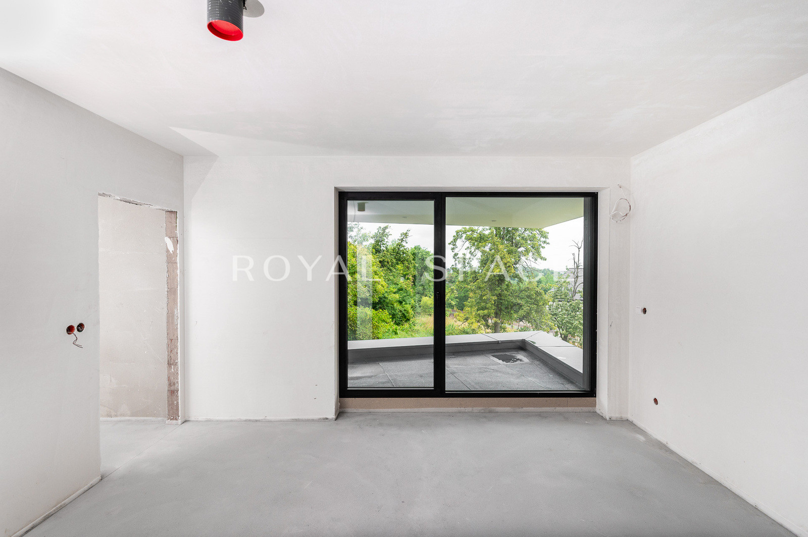 A modern house with large glazing on a hill!