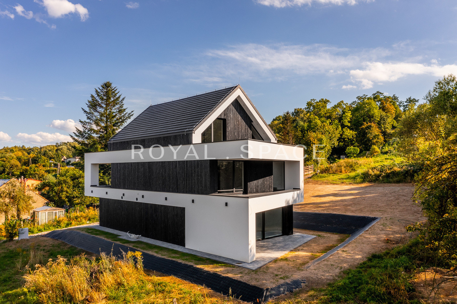 A modern house with large glazing on a hill!