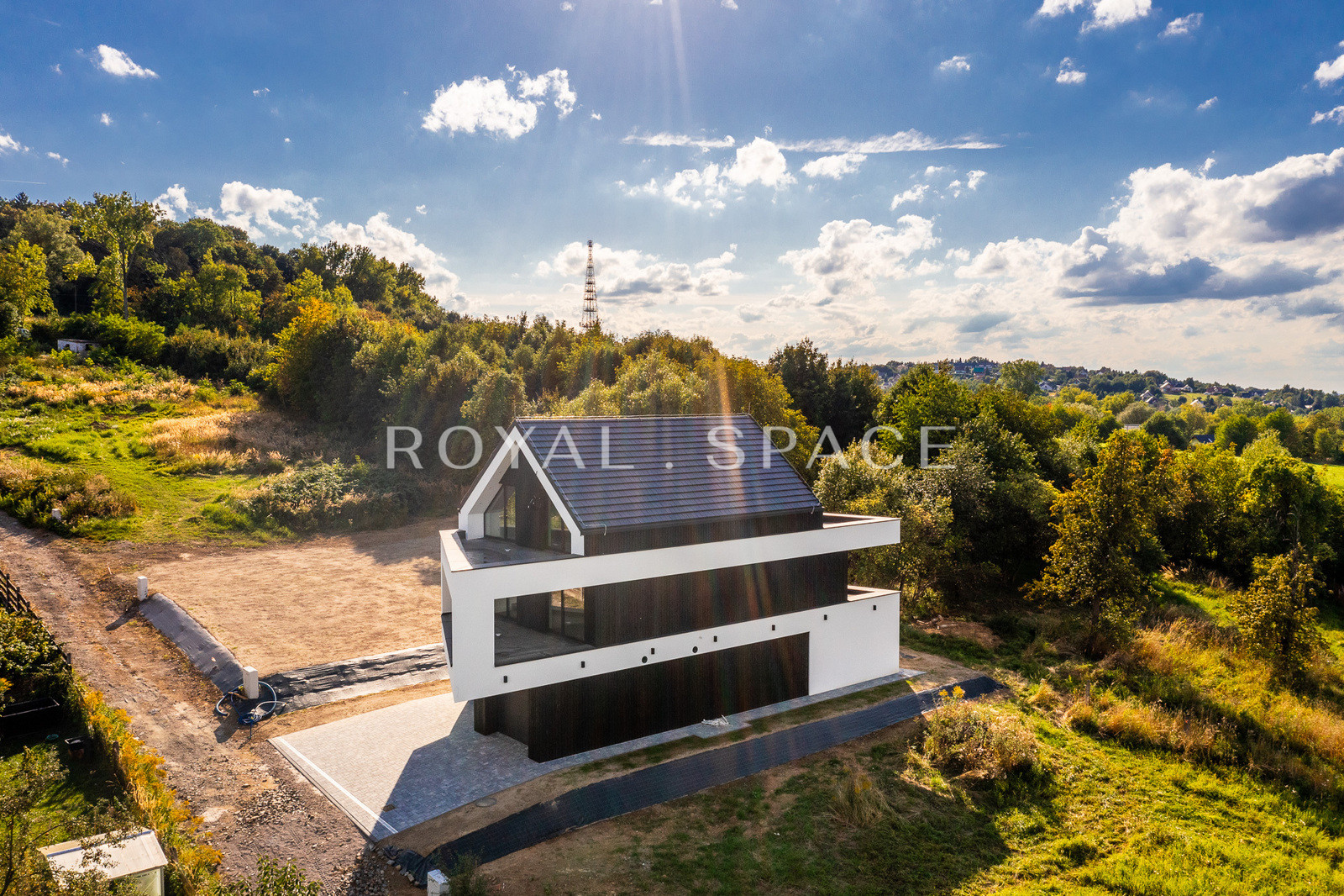 A modern house with large glazing on a hill!