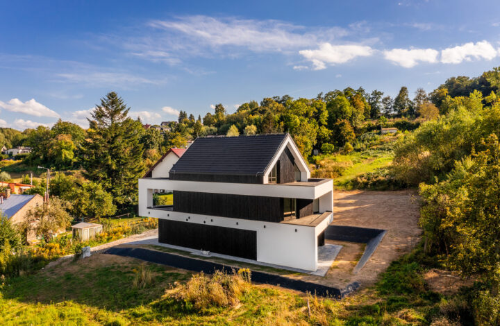 A modern house with large glazing on a hill!